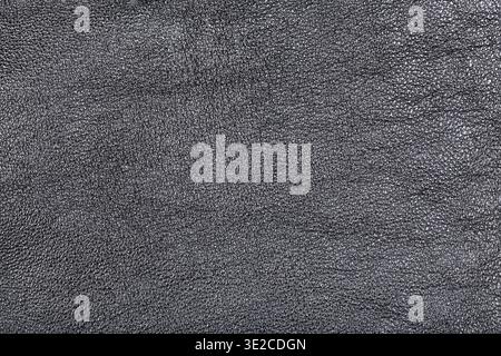 Textured background from black leather close up Stock Photo