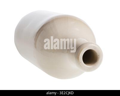 Overturned white ceramic bottle isolated on white background Stock Photo