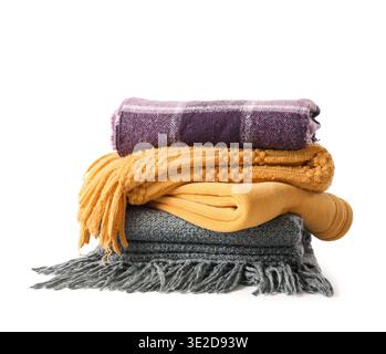 Stack of cozy blankets on white background Stock Photo