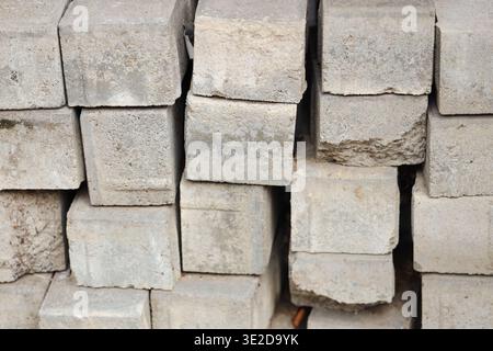 Texture of stacked concrete paving slabs as background, closeup Stock Photo