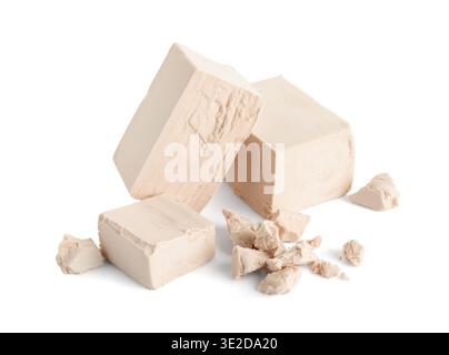 Blocks of fresh yeast on white background Stock Photo