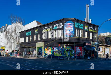Exterior view of the KitKatClub (Sage Club) in Berlin Mitte on Köpenicker Straße with colorful street art, event posters and urban surroundings. Stock Photo