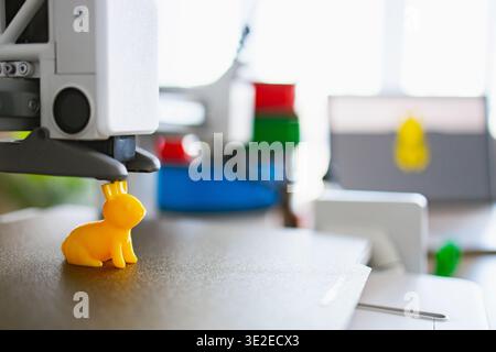 3D Printer Creating Yellow Bunny Stock Photo