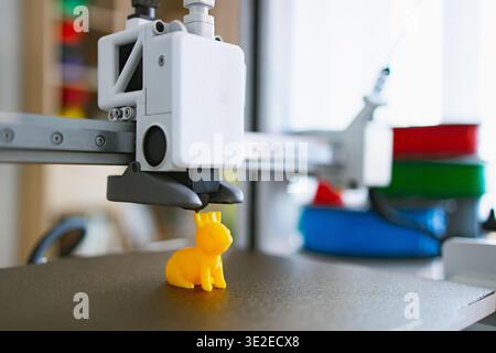 3D Printer Creating Yellow Bunny Stock Photo