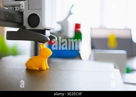 3D Printer Creating Yellow Bunny Stock Photo