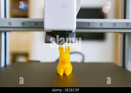 3D Printer Creating Yellow Bunny Stock Photo
