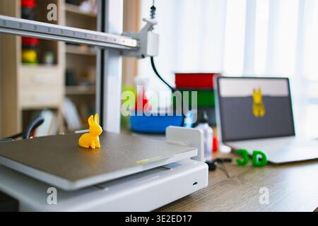 3D Printer Creating Yellow Bunny Stock Photo