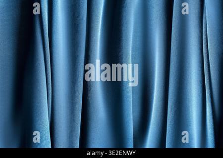 Dark blue cotton drapery closeup as a background Stock Photo