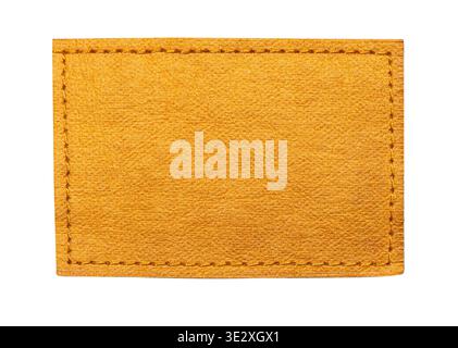 Blank yellow leather clothing tag with visible texture and stitched border, transparent background Stock Photo