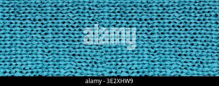 Turquoise knitted texture forming a detailed fabric backdrop Stock Photo