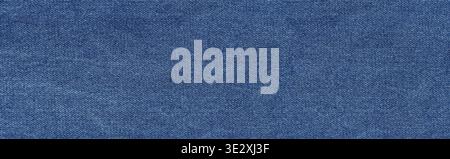 Blue denim fabric creating a textured background pattern Stock Photo