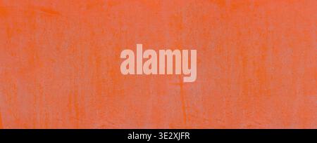 Orange weathered wall surface creating abstract background texture Stock Photo