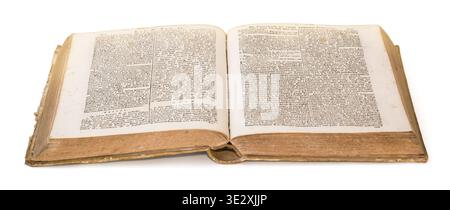 Old open book with aged pages and text resting on a white background Stock Photo