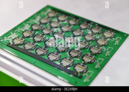 Printed circuit board (PCB) panel with gold plated connectors ready for SMT assembly process. Stock Photo