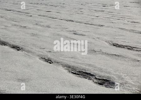 Textured Frozen snow Surface with Linear Grooves Stock Photo