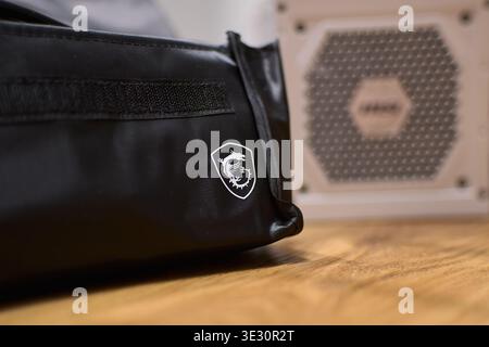Tyumen, Russia-February 15, 2026: Power supply from MSI for personal computer assembly in studio setting during installation process Stock Photo