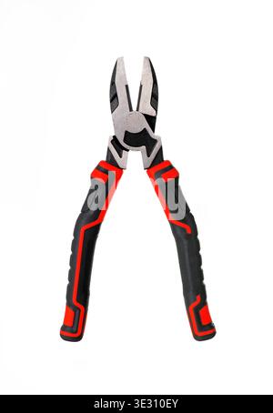 Professional combination pliers with red and black ergonomic handles isolated on white. Metal hand tool. Stock Photo