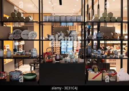 Hong Kong, China - September 21, 2025: View of tea ware including teapots, cups, and accessories displayed on shelves at Fook Ming Tong Tea Shop insid Stock Photo