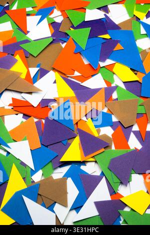 Colored pieces of paper, background. Stock Photo