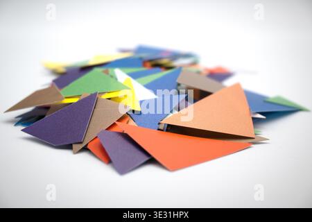 Colored pieces of paper, background. Stock Photo