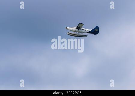 Seaplane flying against clear sky Stock Photo