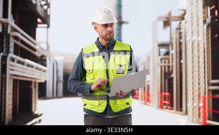 Engineer Diligently Oversees Refinery Control Systems To Maintain Safe Energy Operations Stock Photo