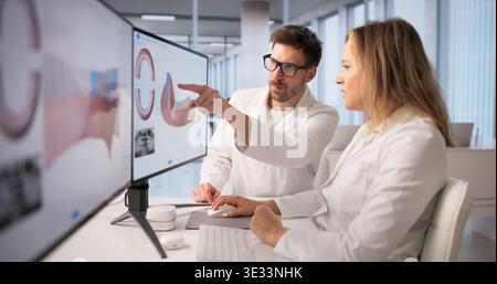 Dentist Conducts Detailed 3D Dental Scan On Patient Using Cutting-Edge Technology In Clinical Setting Stock Photo