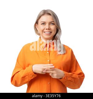 Young businesswoman with hearing aid using sign language on white background Stock Photo