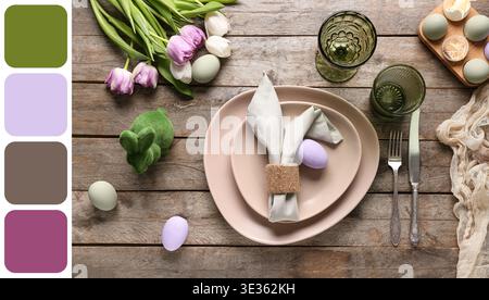 Table setting for Easter celebration with bunny and painted eggs on wooden background. Different color patterns Stock Photo