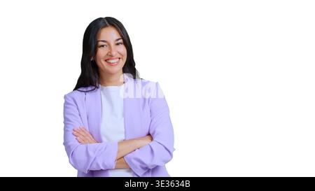 Smiling young businesswoman with crossed arms showing confidence Stock Photo