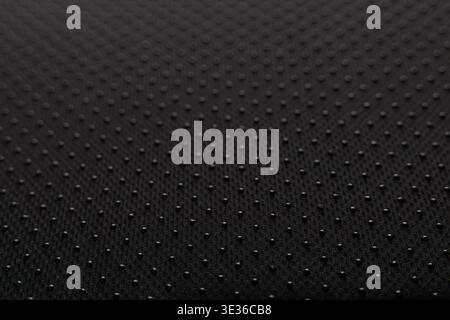 Macro Texture of Black Anti-Slip Fabric with Rubber Dotted Pattern Stock Photo