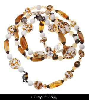 Necklace from beads of brown agate stones, hematite mineral, decorated mother-of-pearl, balls of marble and natural quartz isolated on white backgroun Stock Photo