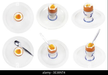 Set of soft boiled egg in egg cup on white plate isolated on white Stock Photo