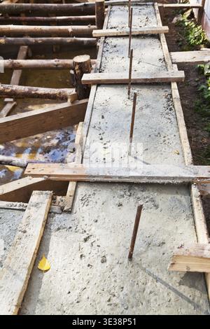 Wooden formwork concrete foundation of house Stock Photo
