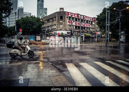 Tel Aviv, Israel, March 21, 2026 Street view of Tel Aviv under the rain with light reflections on the wet pavement and moody urban atmosphere. Stock Photo