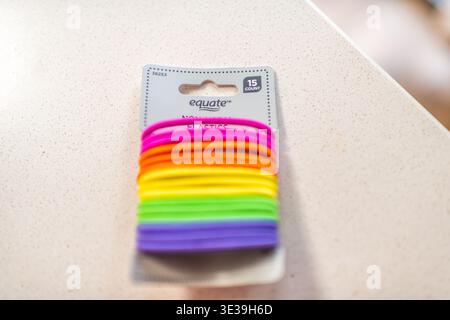 Roseland, USA - February 18, 2025: Equate hair ties multicolored product non metal elastics bands bought from Walmart Stock Photo