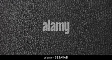 Black leather surface displaying a detailed and textured material background Stock Photo