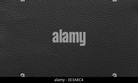 Black leather surface displaying a detailed and textured material background Stock Photo