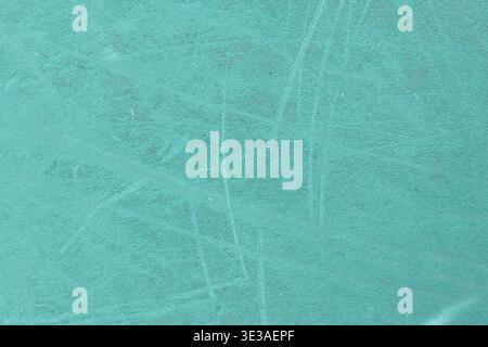 Turquoise textured background with subtle scratches and grainy surface pattern Stock Photo