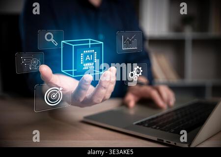 Hand presenting a glowing AI agents cube with search, analytics and automation icons, symbolizing intelligent systems, business tools, machine learnin Stock Photo