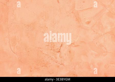 Old cement plaster wall texture. Peach color painted background Stock Photo