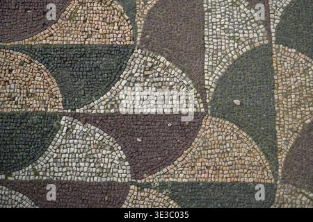 Baths of Caracalla mosaic floor detail, Terme di Caracalla. Rome, Italy. Ancient Roman geometric tessellation pattern on stone floor. Stock Photo