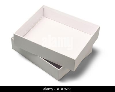 two empty white rectangular cardboard boxes isolated white background, stacked matte paper with clean edges, mock-up template in top view with shadows Stock Photo
