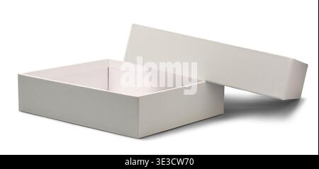 empty white rectangular cardboard box isolated white background, clean matte paper texture with lid placed on side, mock-up template with shadow Stock Photo
