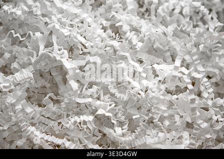White crinkle paper packing filler for gift box cushioning and decorative protective packaging Stock Photo