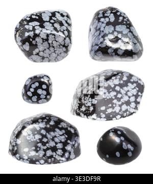 Set of various snowflake obsidian gemstones, against white background Stock Photo