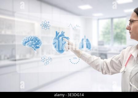 doctor interacting with holographic medical dashboard showing organs and data representing advanced healthcare analytics and ai technology Stock Photo