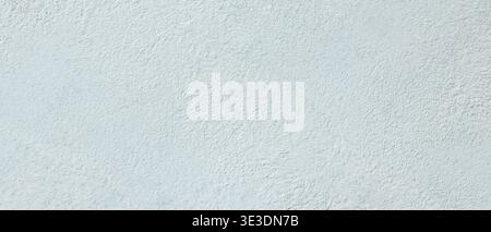 Light blue painted concrete wall texture with rough surface for minimal background design Stock Photo