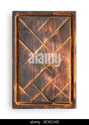 Small rectangle shaped brown used oak wood kitchen cutting board with dark burn stains and knife cut traces isolated on white background, top view Stock Photo