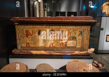 Munich, Germany - 30 Mar 24: Painted wooden funerary panel with hieroglyphs and offering figures on display at the Staatliches Museum Ägyptischer Kuns Stock Photo